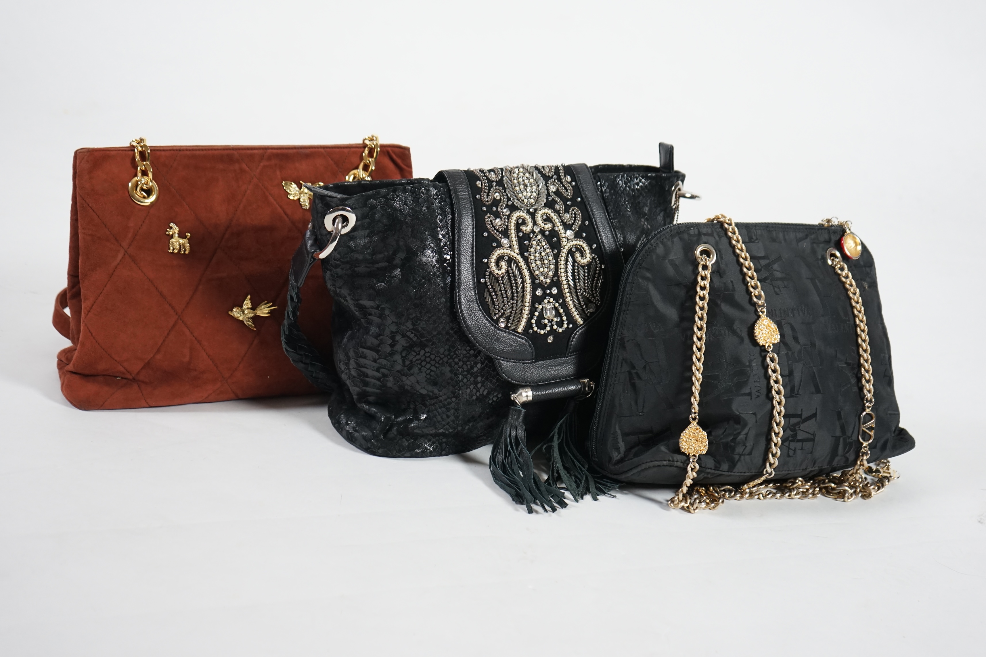 A selection of lady's handbags including a VERY Valentino black canvas bag with gold decorated chain handles, a Mary Frances black suede faux snake skin print shoulder bag with embellished fastening, a tan suede shoulder